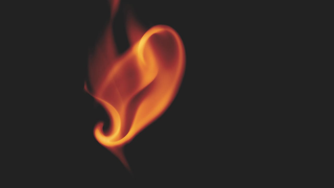 Ear shaped flame image by Marek Piwnicki