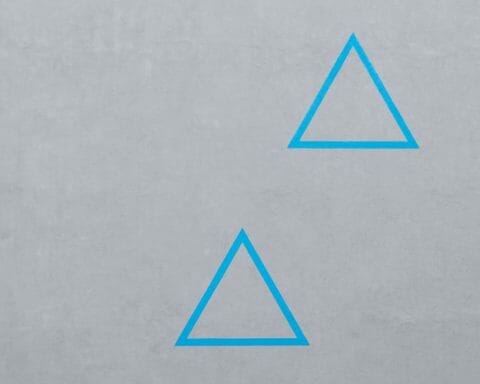 Two blue triangles - Image by Pawel Czerwinski