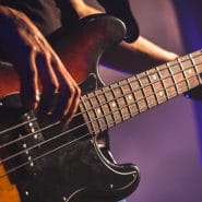 Bass Guitar Techniques - Bass player using fingerstyle technique