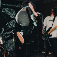 Make A Musician Website - Image of a band rocking out by Natalie Parham