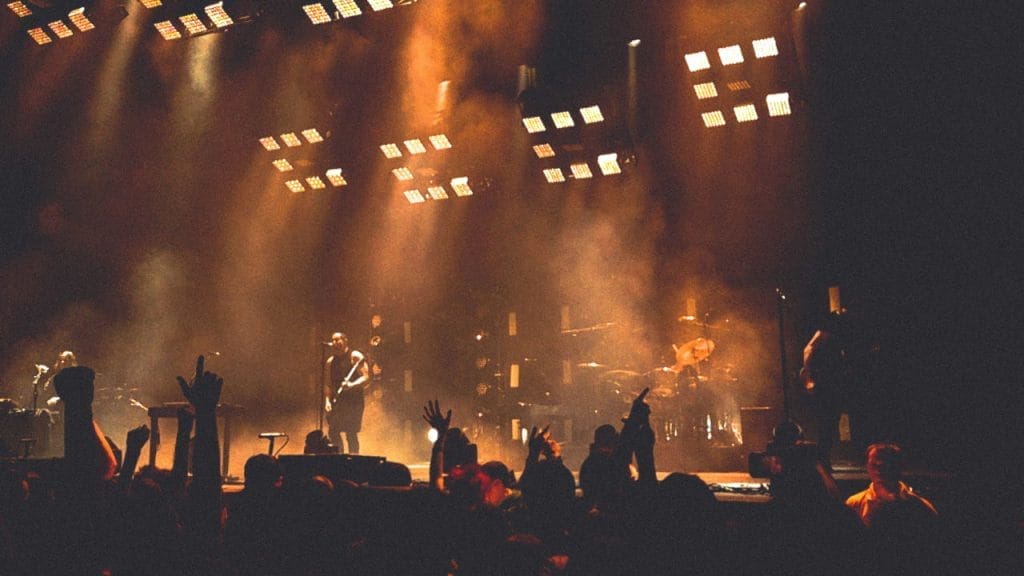Image of musicians performing in a bug venue by Pawel Bukowski