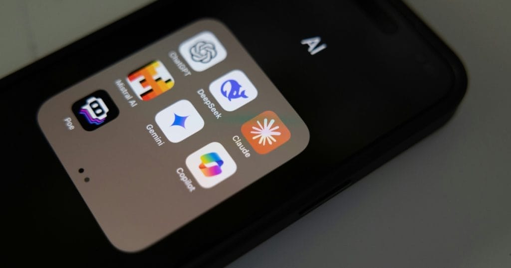 Cell phone with various AI apps installed - Image by Solen Feyissa