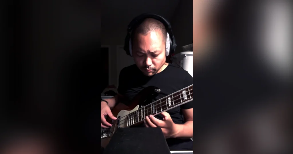 Posido Vega playing the bass at 2AM