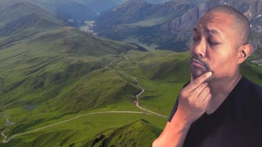 Posido Vega looking down and thinking about a path